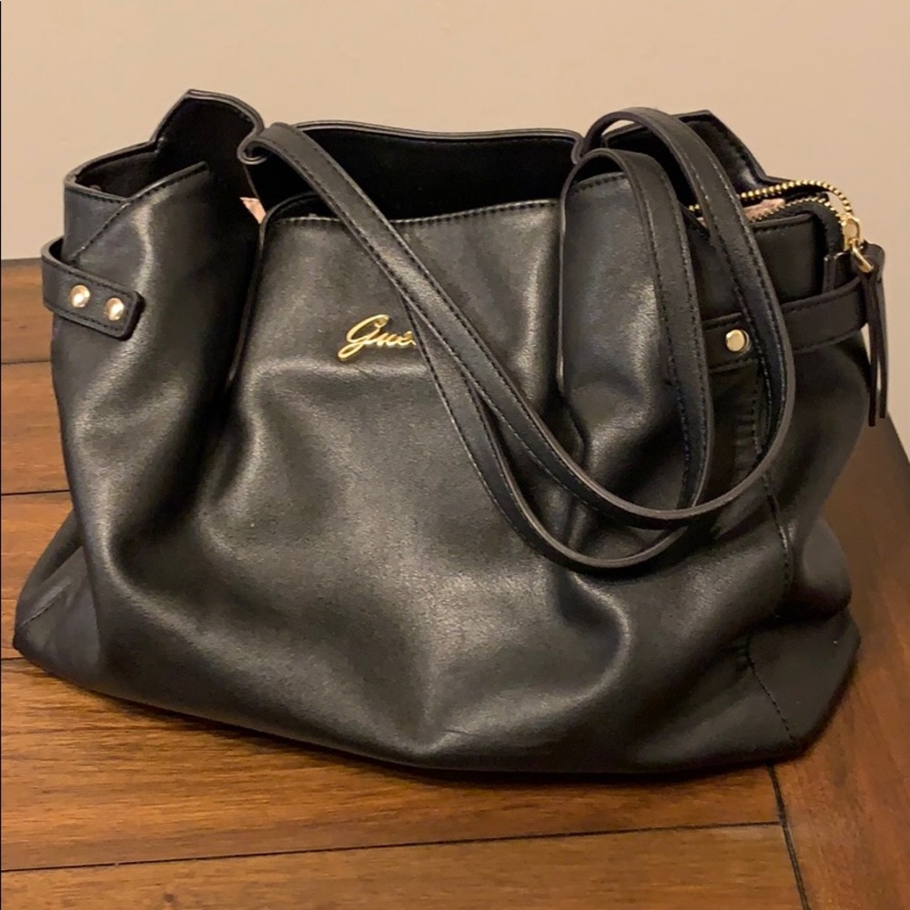 Guess black medium sized tote with tan fabric
